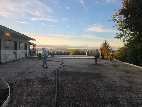 Crew on the gravel base before the concrete pour