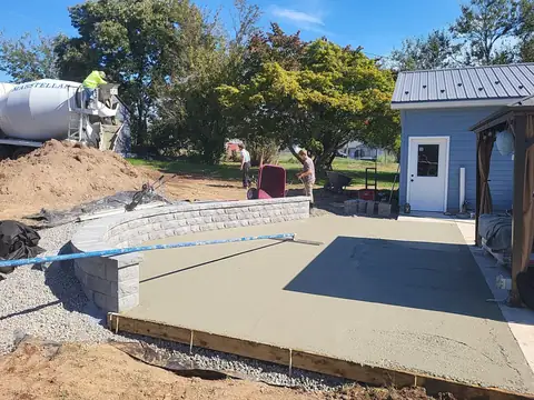 Forms and gravel base for a concrete patio pour