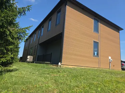 Side elevation of a modern two-story custom home